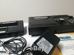 ColecoVision Console with Atari 2600 Expansion Module and controllers