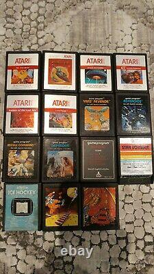 Colecovsion with Atari module, roller controller + 4 controllers and games +more