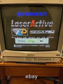 Pioneer LaserActive CLD-A100 with Sega PAC-S10 module, controller, remote, game